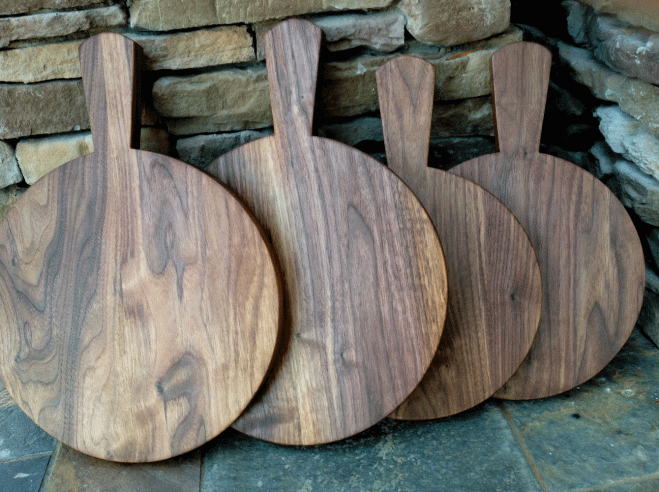 round cutting board with paddle handle